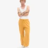 Pantalones de chándal holgados de algodón orgánico - Amarillo quemado