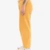 Pantalones de chándal holgados de algodón orgánico - Amarillo quemado