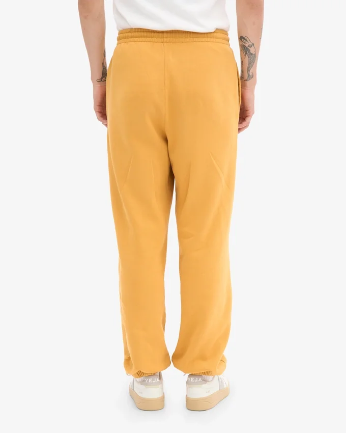 Pantalones de chándal holgados de algodón orgánico - Amarillo quemado